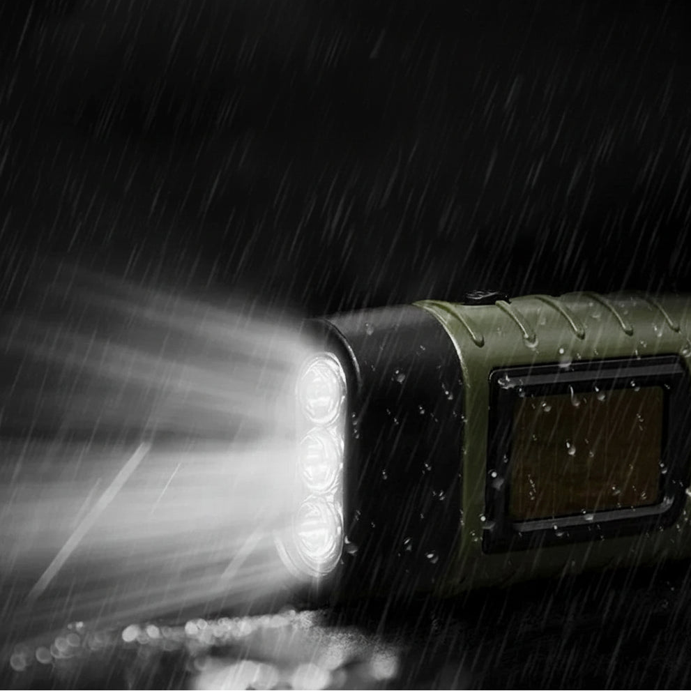 Survivalowa latarka LED z korbką ręczną zasilana energią słoneczną